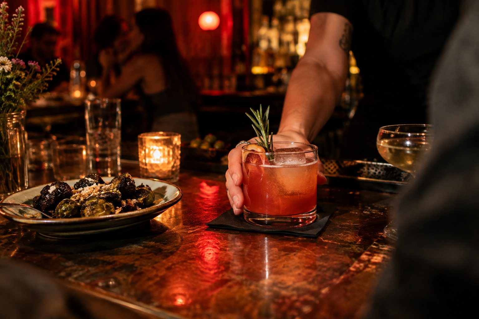 Cocktail and small plate at an intimate Austin bar